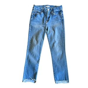Good American raw hem stretch denim jeans